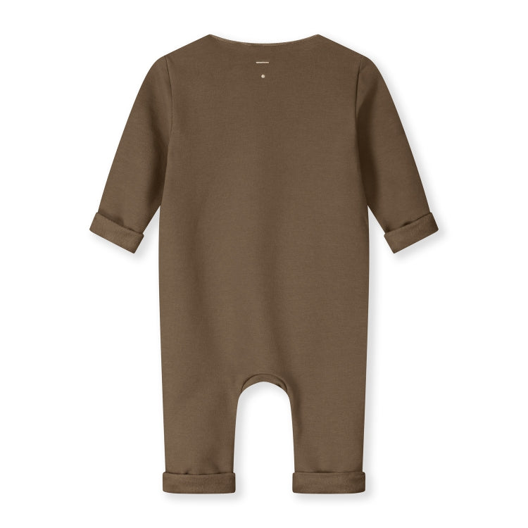Organic cotton fleece baby suit made from GOTS-certified cotton, shown in brown colour. Back sude