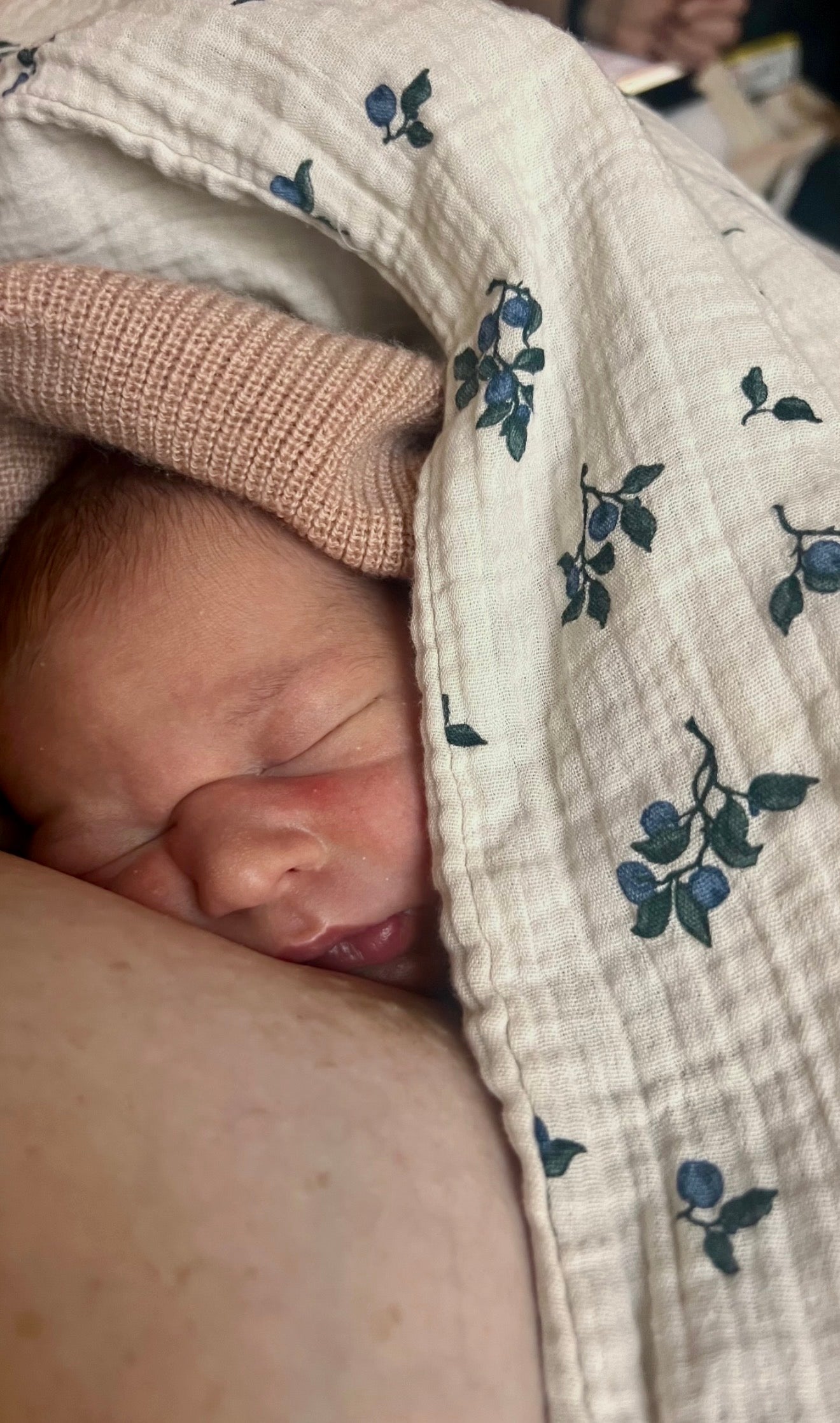 Baby wrapped in blankets sleeping