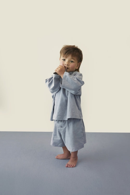 Child wearing Gray Label organic cotton oversized tee in stone grey