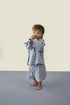 Child wearing Gray Label organic cotton oversized tee in stone grey