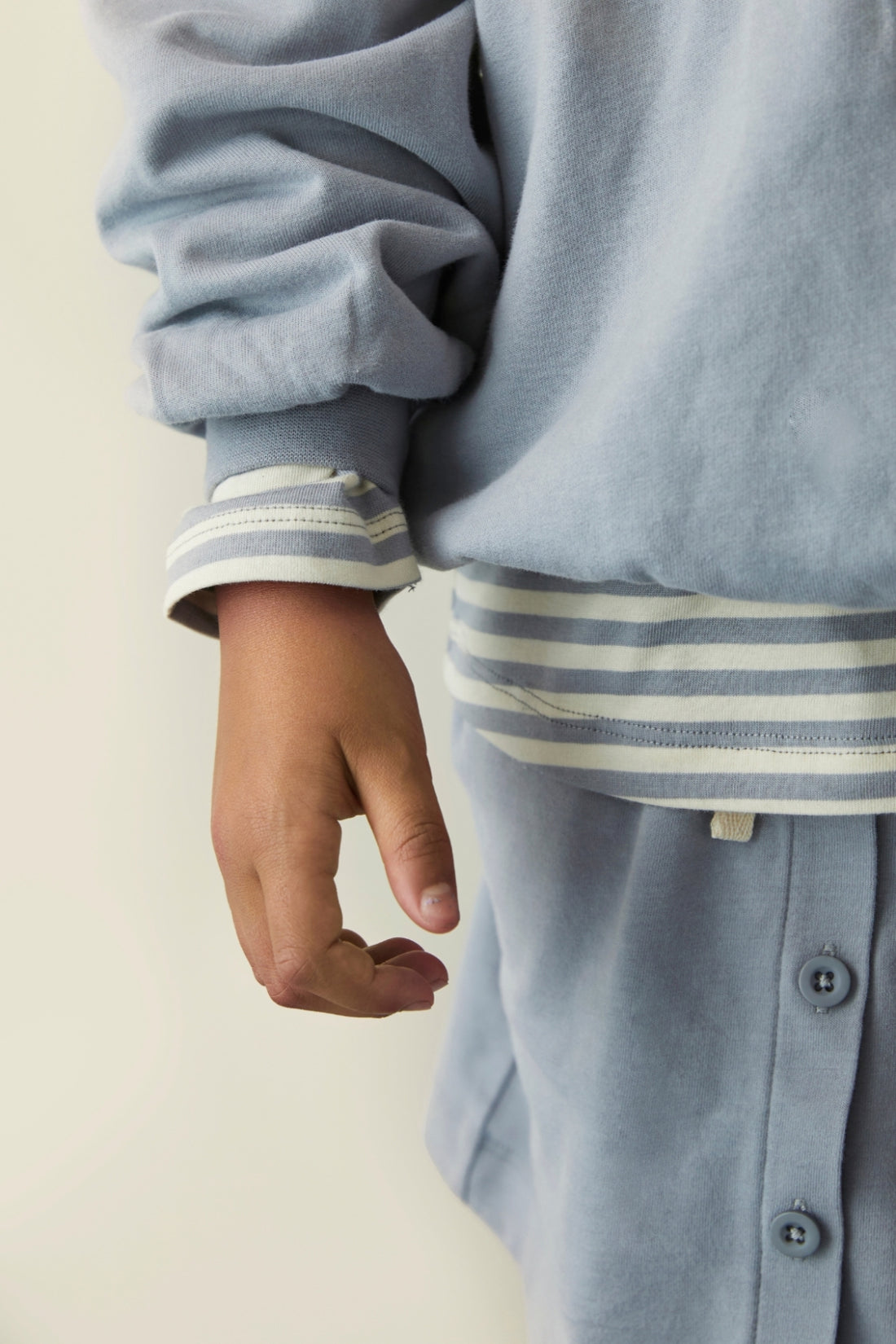 Close up Striped long sleeve top by Gray Label in color Stone Grey Layered under sweater 