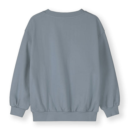 Organic cotton fleece dropped shoulder sweater made from GOTS-certified cotton, shown in blue from the back