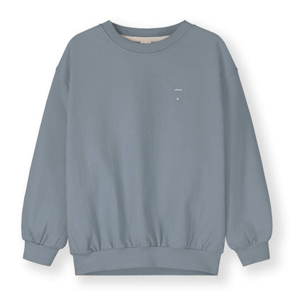 Organic cotton fleece dropped shoulder sweater made from GOTS-certified cotton, shown in blue
