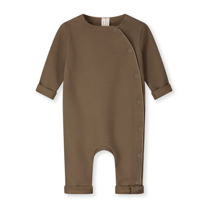 Organic cotton fleece baby suit made from GOTS-certified cotton, shown in brown colour