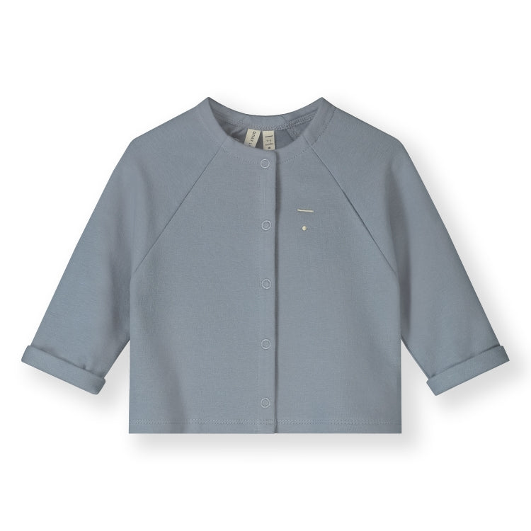 Organic cotton fleece raglan cardigan made from GOTS-certified cotton, shown in blue
