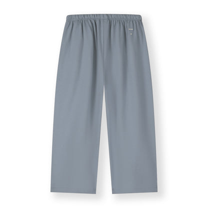 Gray Label organic cotton pull-up trousers in color stone grey - back
