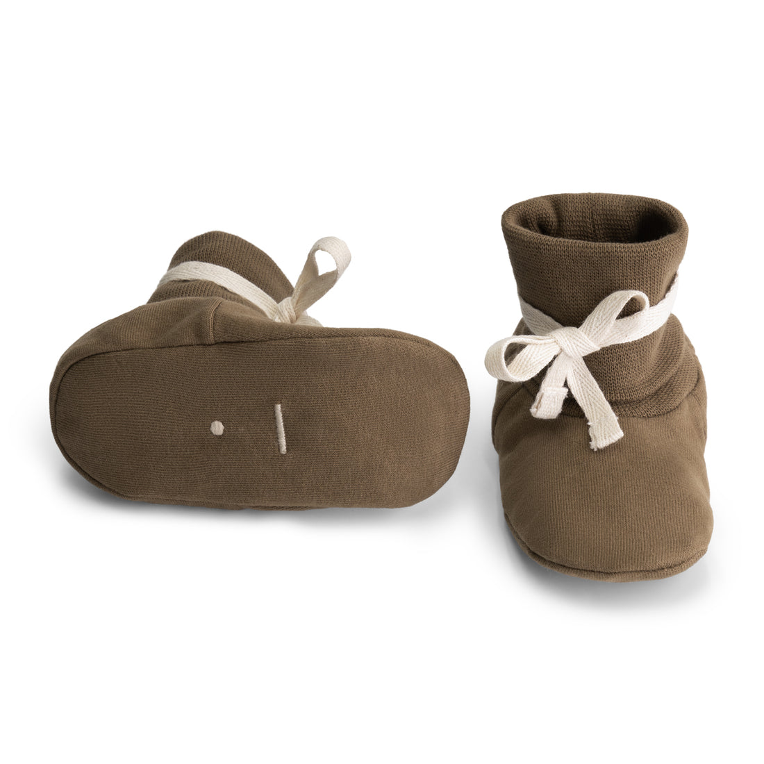 Detail of tie fastening on organic cotton fleece baby booties
