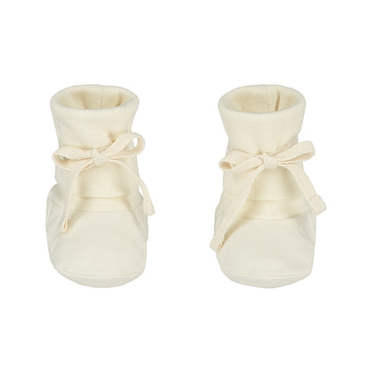 Organic cotton fleece baby booties made from GOTS-certified cotton, shown in white colour