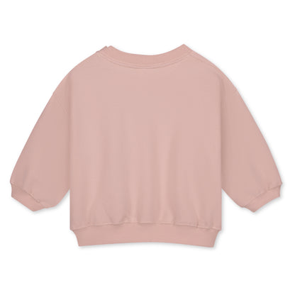 Organic cotton fleece dropped shoulder sweater made from GOTS-certified cotton, shown in pink colour. Back side