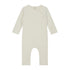 Organic cotton fleece baby suit made from GOTS-certified cotton, shown in white colour