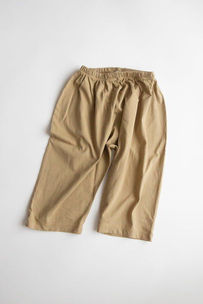 Kohi Wide Pants by Façade in hay, organic cotton kids trousers with a relaxed barrel fit