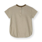 Detail of snap fastenings on organic cotton baby tee suit