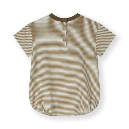 Detail of snap fastenings on organic cotton baby tee suit