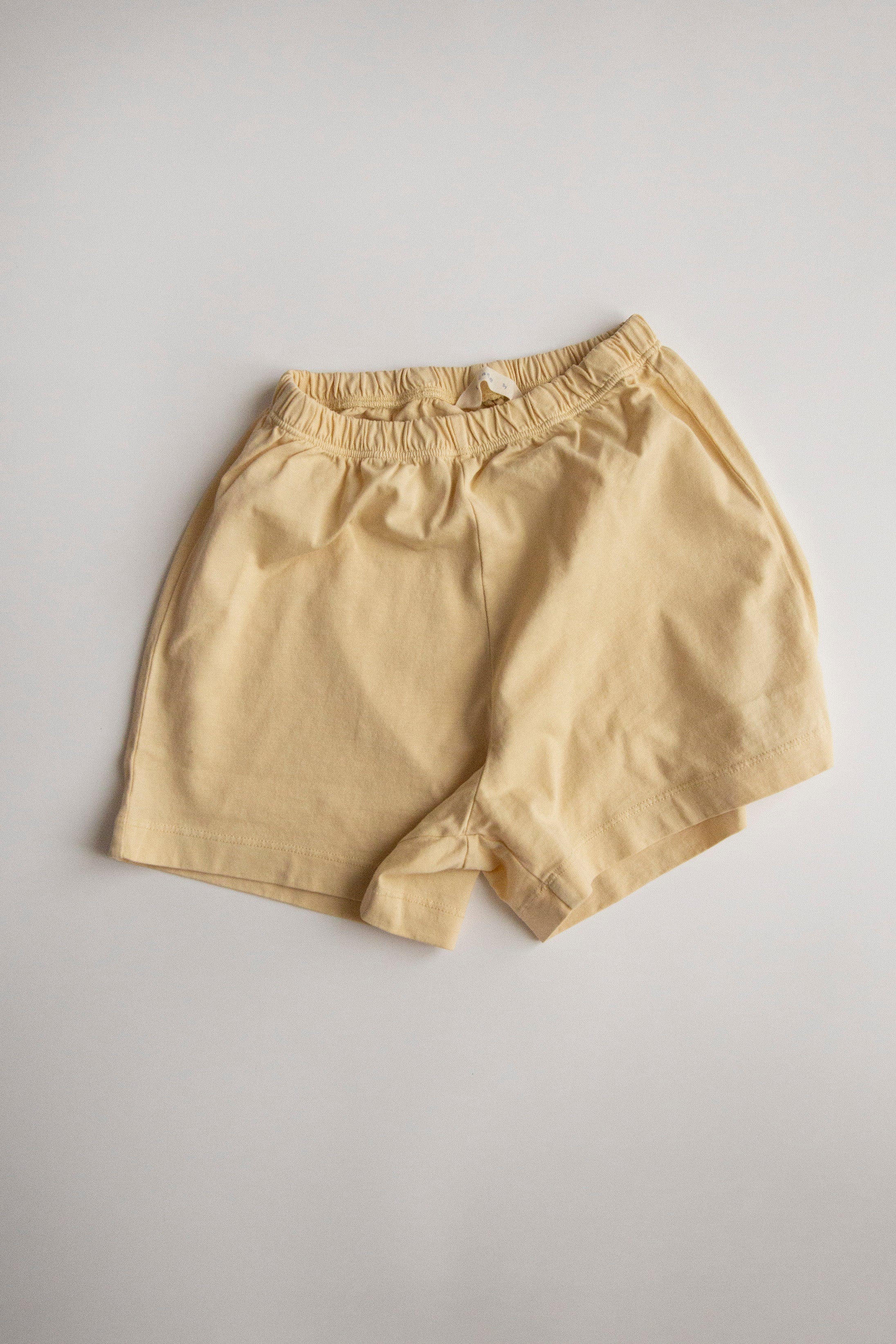 Mido Runner Shorts by Façade in butter, organic cotton kids shorts with a relaxed runner fit