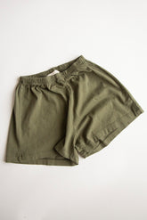 Mido Runner Shorts by Façade in green, organic cotton kids shorts with a relaxed runner fit