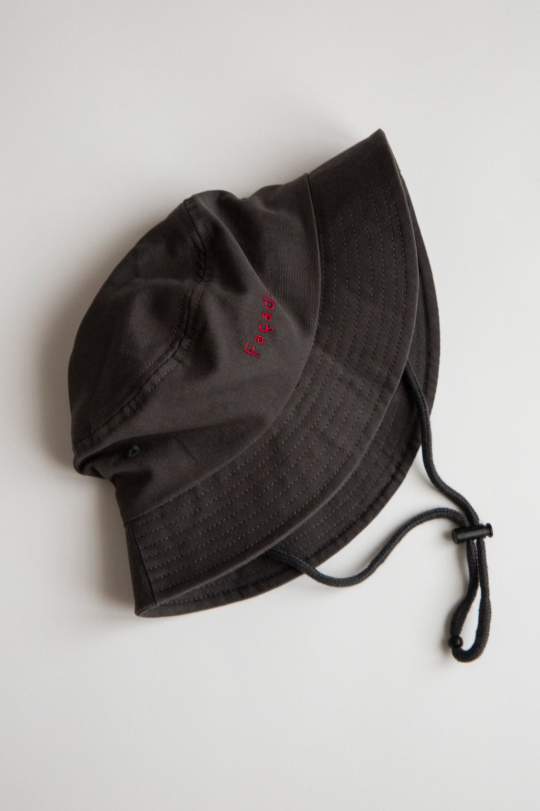 Refu Camping Hat by Façade in asphalt grey, organic cotton kids bucket hat with chin cord