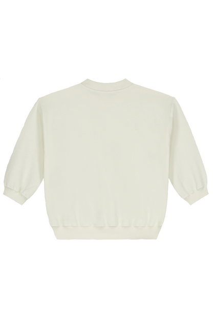 Gray Label organic cotton fleece baby sweater in cream - back