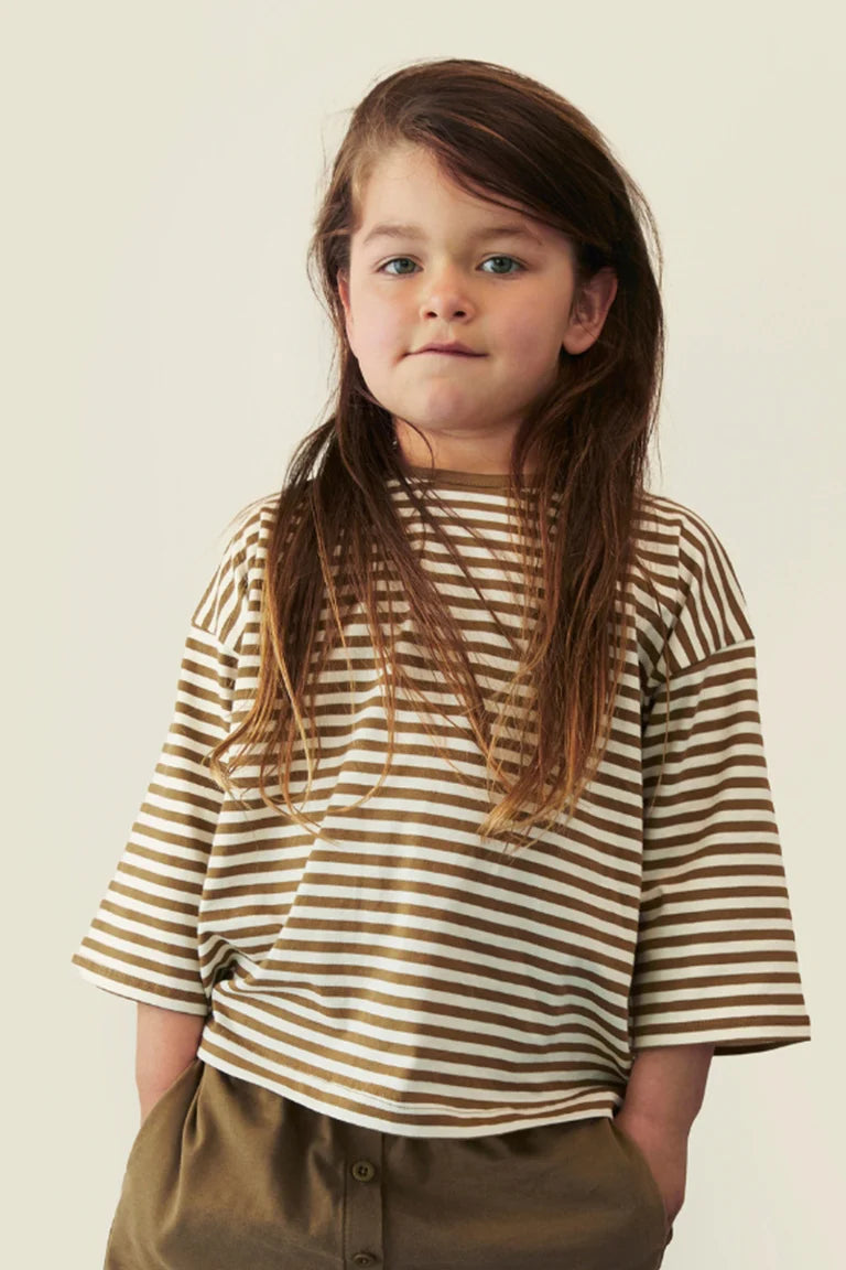 Child wearing Gray Label organic cotton oversized tee in Woody Cream