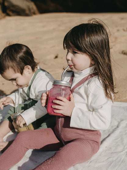 Child wearing Silly Silas Footless Tights with Braces in Acai Smoothie